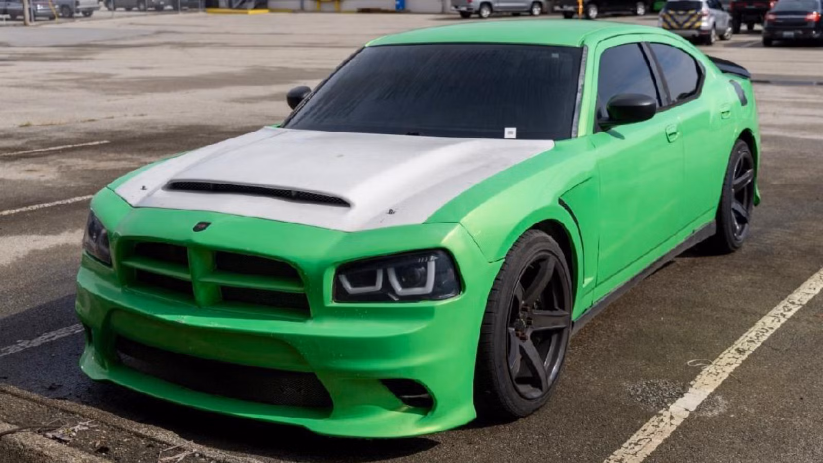 Louisville Police Are Crushing A Stolen-Parts Hellcat Charger Under A Monster Truck