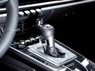 Porsche Just Confirmed More Gas Engines, Manual Sports Cars, And A Mid-Engine Supercar